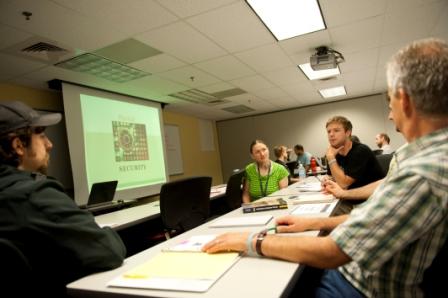M.P.S. Cybersecurity student in classroom discussion