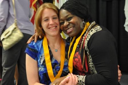 joyful nursing students pose after pinning ceremony