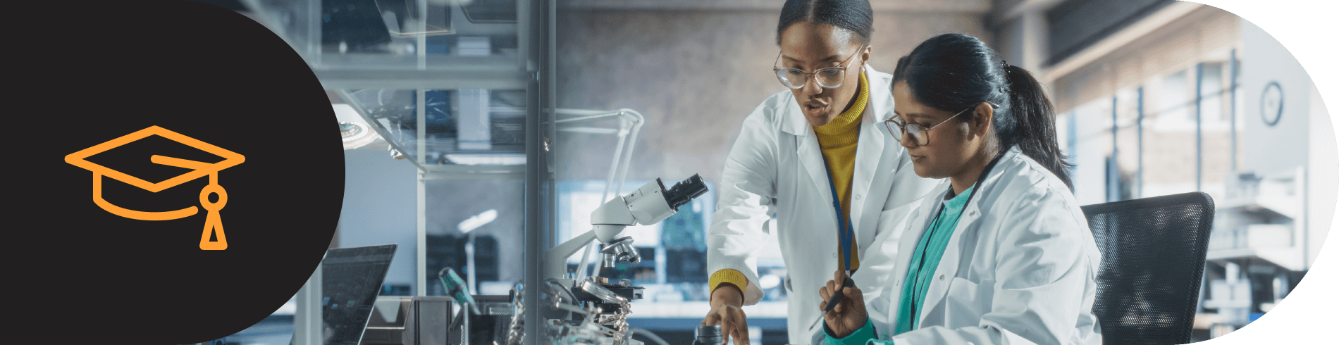 Graduation cap icon and two students in lab