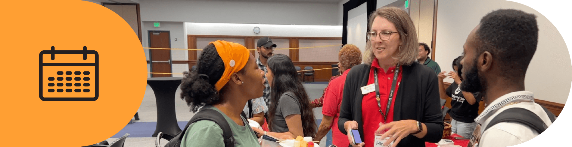 Calendar icon and students talking with staff at an event