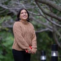 Amy Caballero standing outside on campus