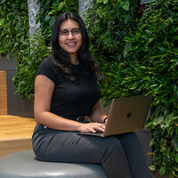 Fernanda Ventura sitting with laptop
