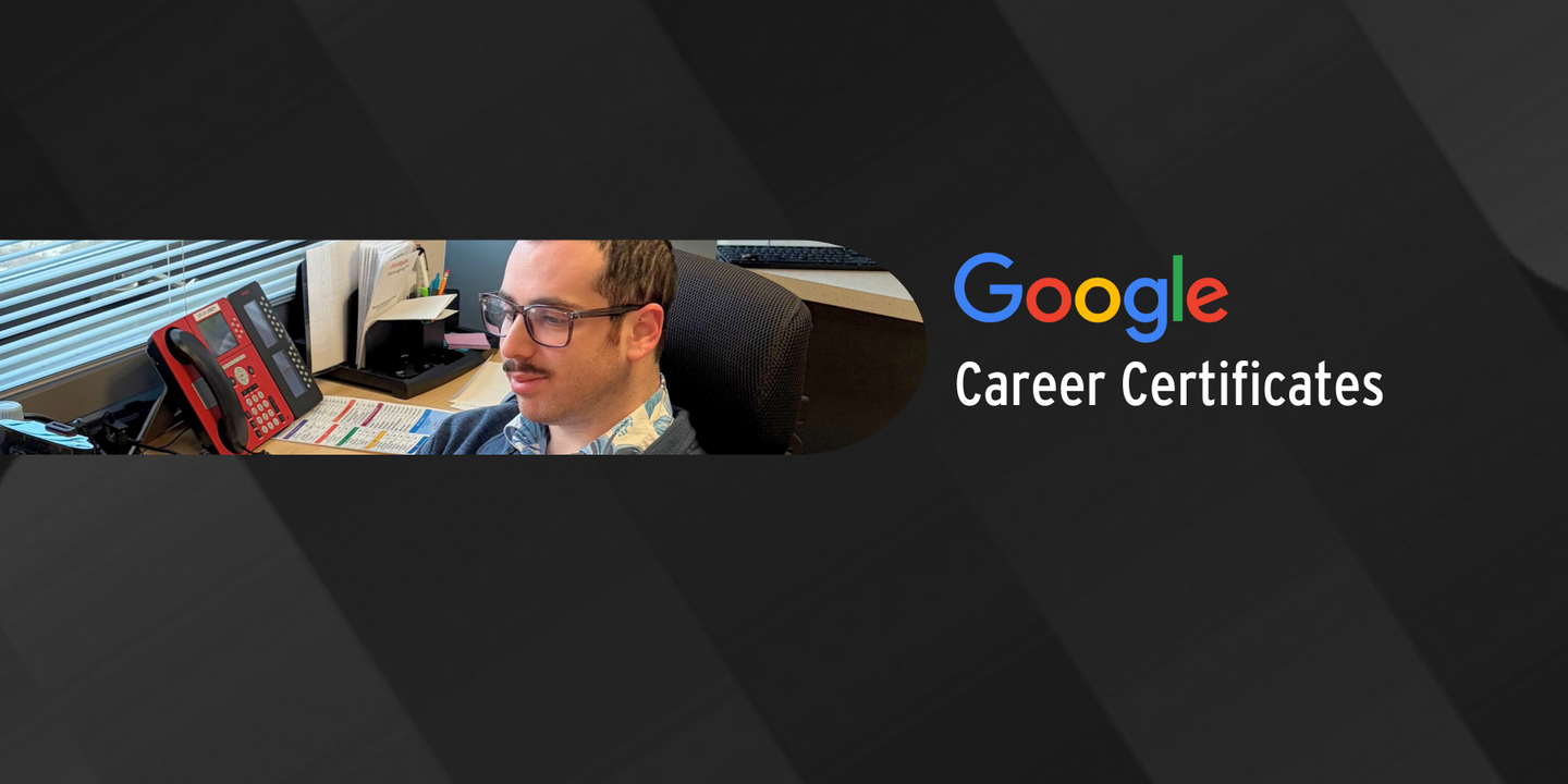 Grow With Google text with an IT employee at their desk.