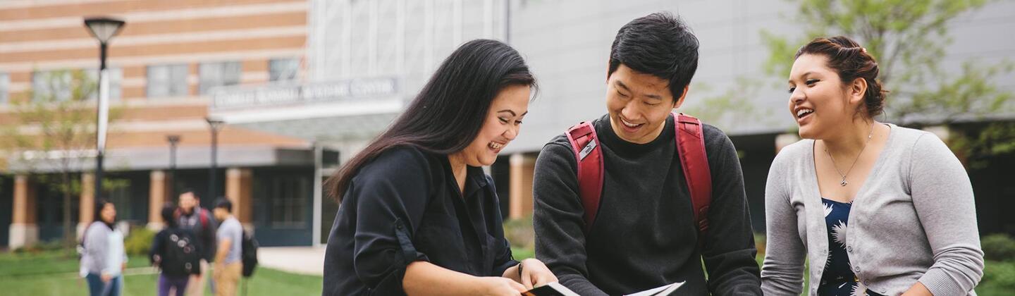 Students sitting and laughing