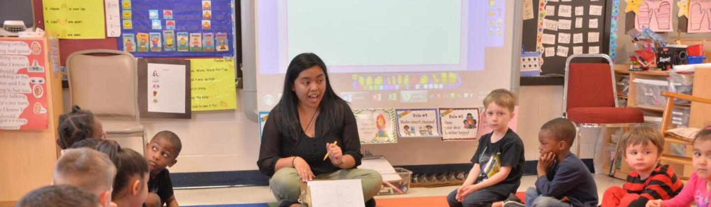 Teacher with kids in classroom