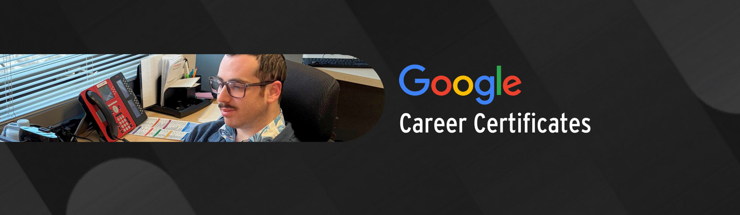 Grow With Google text with an IT employee at their desk.