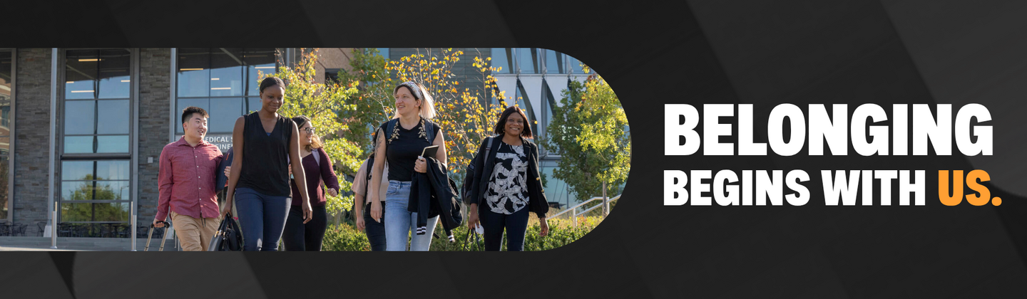 Diverse students walking on campus with slogan "Belonging begins with us."