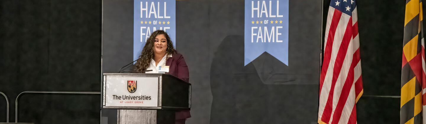 Sirelmy “Sisi” Santos speaking at podium