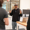 Professor speaking to students in a lab