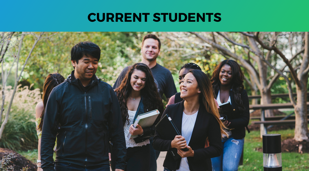 Students walking and laughing with one another